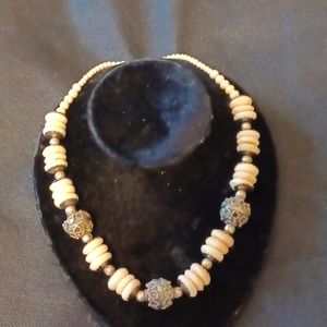 Vintage Boho necklace fom the 70's with cream color beads and silvertone beads